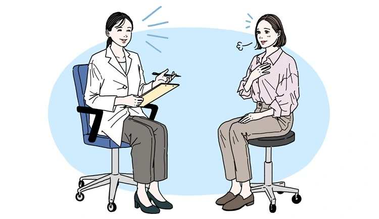 医師とのカウンセリングに満足する女性患者